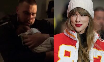 Travis Kelce carrying a baby girl